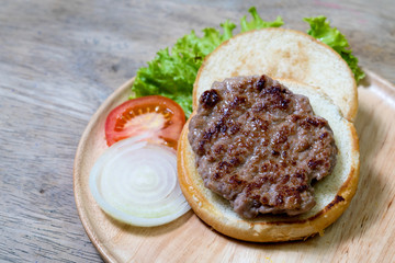 pork burger on wooden dish,homemade