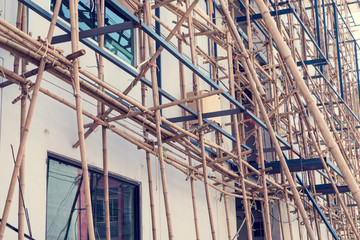 scaffolding at construction with wooden bamboo,Vintage Tone