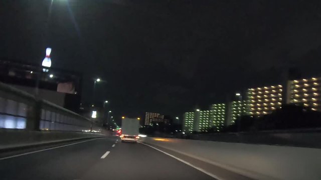 TOKYO, JAPAN. 2019 July 7th. POV Driving Night View of Shutoko Highway, Tokyo