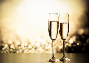 two champagne glasses ready to bring in the New Year