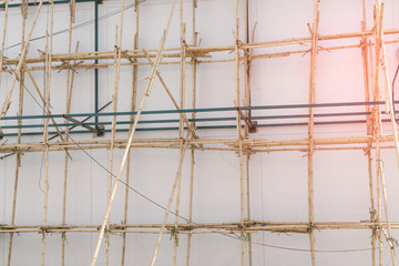 scaffolding at construction with wooden bamboo