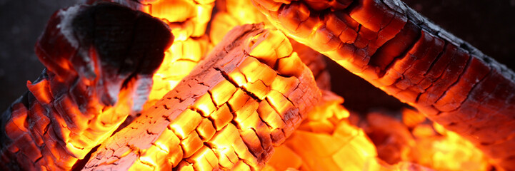 Hot charcoal bonfire orange background