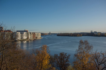 Sunny autumn view over Stockholm districts at the lake Mälaren Essinge, Kungsholmen and Långholmen 