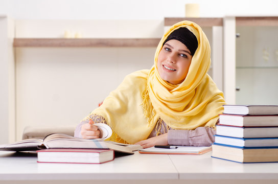 Female Student In Hijab Preparing For Exams