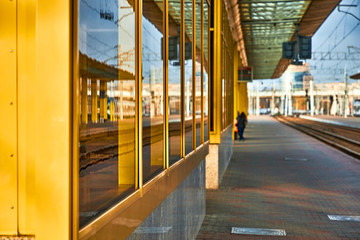 Underpass windows with reflection of rail tracks