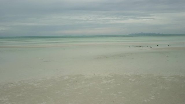 Drone flight over shallow water and beach  - Nathon Beach - Koh Samu - Thailand