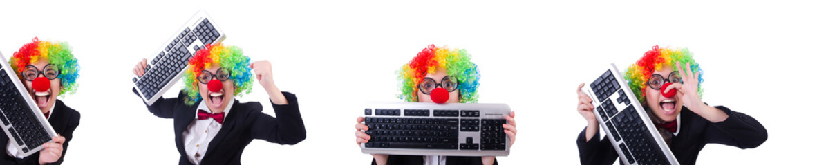 Funny clown with keyboard on white