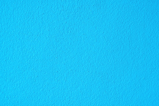 Blue cement or concrete wall texture for paper background.