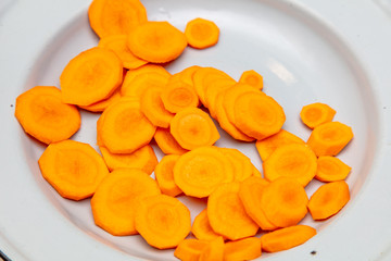 Sliced boiled carrots in a plate