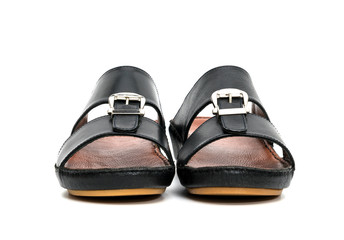 Black leather slippers isolated on white background