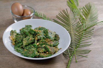 Fried Egg With Climbing Wattle or cha-om omelettes,Thai food