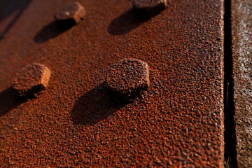 oxidized rusty steel plate and rivet