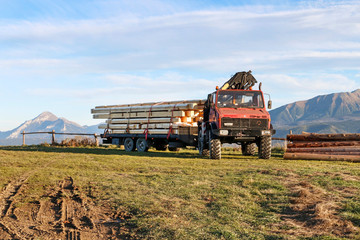 Fototapeta premium ZAKOPANE, POLAND - SEPTEMBER 19, 2019: A multi-purpose truck used for transporting wood in the mountains