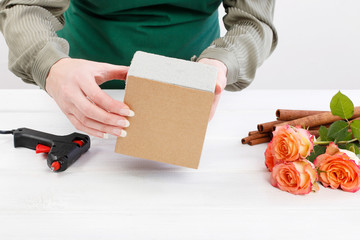 How to make floral arrangement with roses and cinnamon sticks