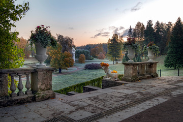 Fragment of an ancient Italian staircase with a marble Lion in Pavlovsk Park on a frosty autumn morning. Pavlovsk, Saint Petersburg, Russia
