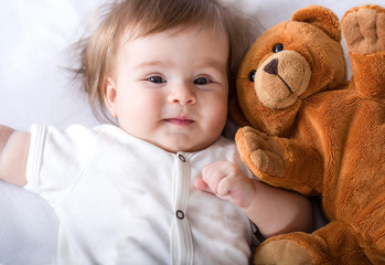 Baby newborn smile joy  positive toy teddy bear