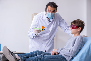 Young boy visiting doctor in hospital