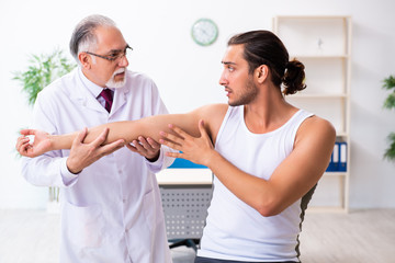 Young male patient visiting experienced doctor
