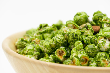 Lush of Japanese matcha green tea popcorn with white background for copy space text, Popular snack with favorite movie