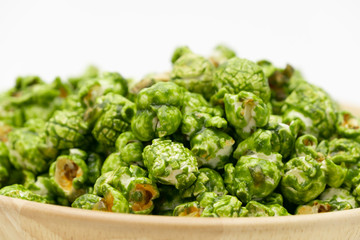 Lush of Japanese matcha green tea popcorn with white background for copy space text, Popular snack with favorite movie