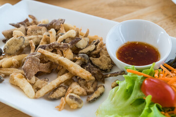 Deep fried mushroom with sweet and spicy sauce.