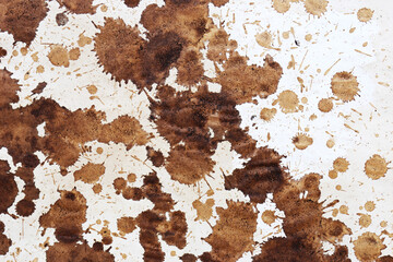 Brown coffee stains on paper background