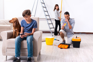 Young family doing home renovation