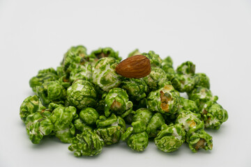 Lush of Japanese matcha green tea popcorn isolated on white background, Popular snack with favorite movie