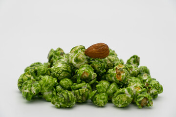 Lush of Japanese matcha green tea popcorn isolated on white background, Popular snack with favorite movie