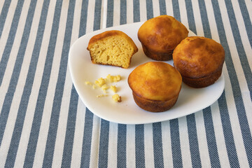 Balkan cuisine. Proja -  dish made of corn flour.  Cornbread, prepared as a muffin , on white plate