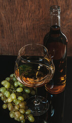White wine bottle and wine glass