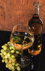 White wine bottle and wine glass