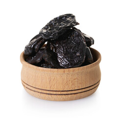 prunes in a wooden bowl