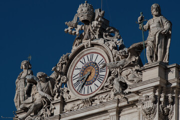 Fototapeta na wymiar Vatican, Italy, clock at St. Peter's Basilica in Rome