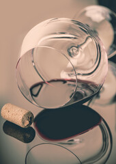 lying glass with red wine