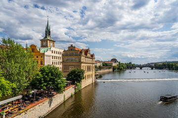 Fototapeta na wymiar Scenic panorama cityscape view of Moldava river boat Prague in Czech Republic.
