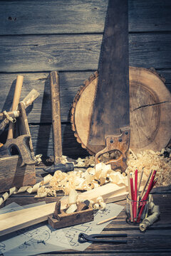 Wooden joinery box with tools in rustic wooden shed