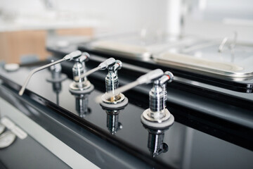 Row of modern equipment for dental healthcare and treatment