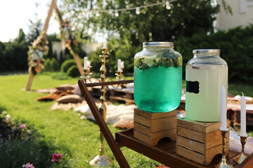  large can with lemonade on a picnic in the rest