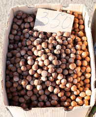 Hazelnuts in a box for sale