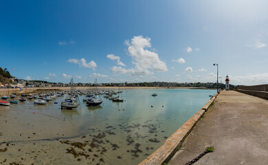 the old harbor and lighthouse of Erquy in Brittany
