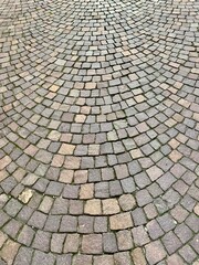 Cobblestone street in a curved pattern