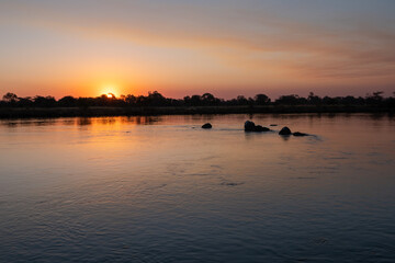 Romantic Sunset on the Okavango River, Caprivi Strip, Namibia, Africa - Beautiful, Serene, Lonely Landscape