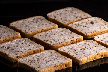 sliced bread isolated on black background