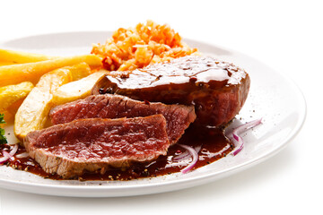 Grilled steak with french fries on white background