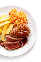 Grilled steak with french fries on white background