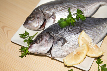 fresh fish with lemon and parsley
