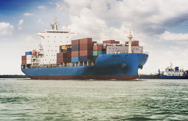 Fototapeta premium Logistics and transportation of International Container Cargo ship in the ocean at Sunshine sky, Freight Transportation, Shipping