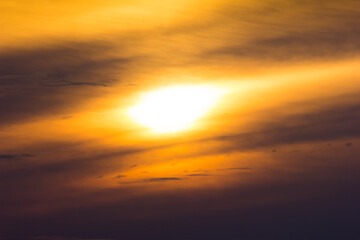 Sunset / sunrise with clouds, light rays and other atmospheric effect