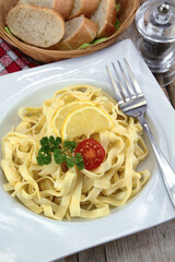 fresh tagliatelle butter on a plate